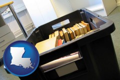 louisiana map icon and a moving box in an empty office, during a relocation project