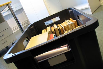 a moving box in an empty office, during a relocation project